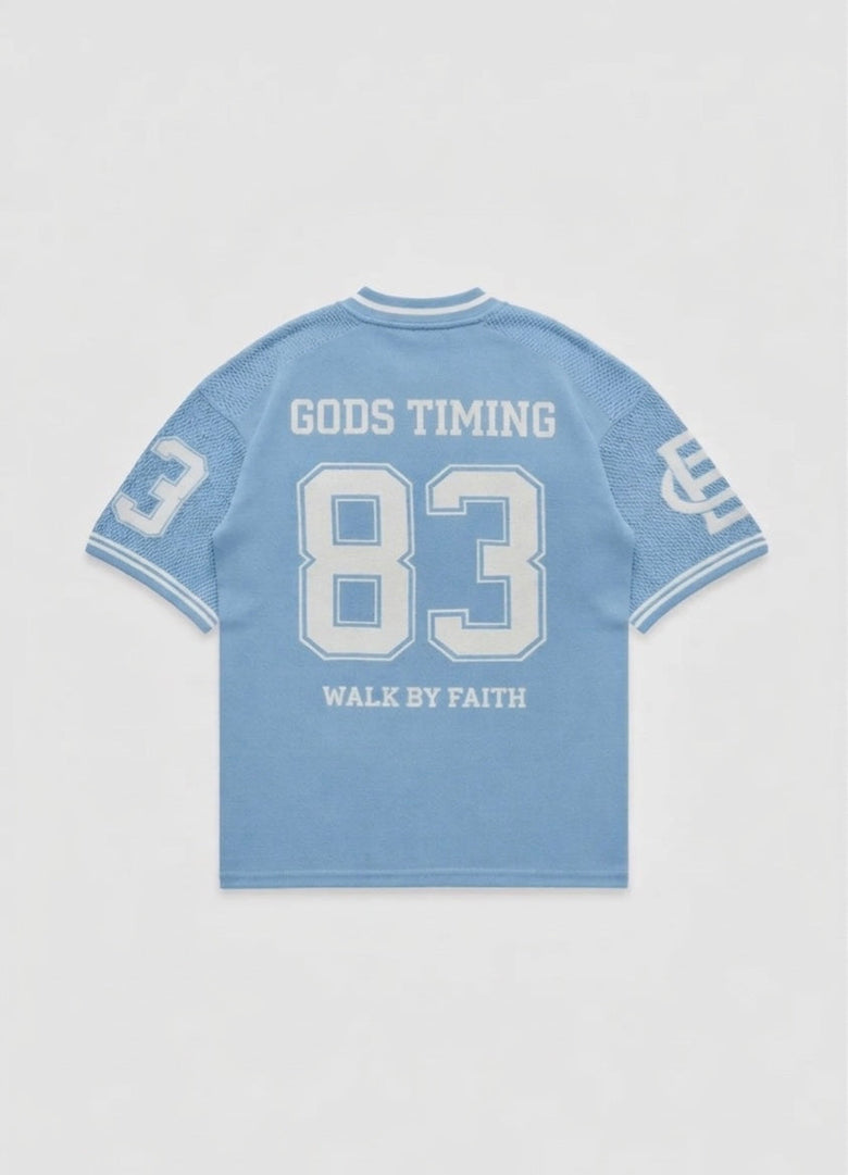 Back view of Benir Clothing light blue knit jersey featuring the number 83 and God's Timing text in white