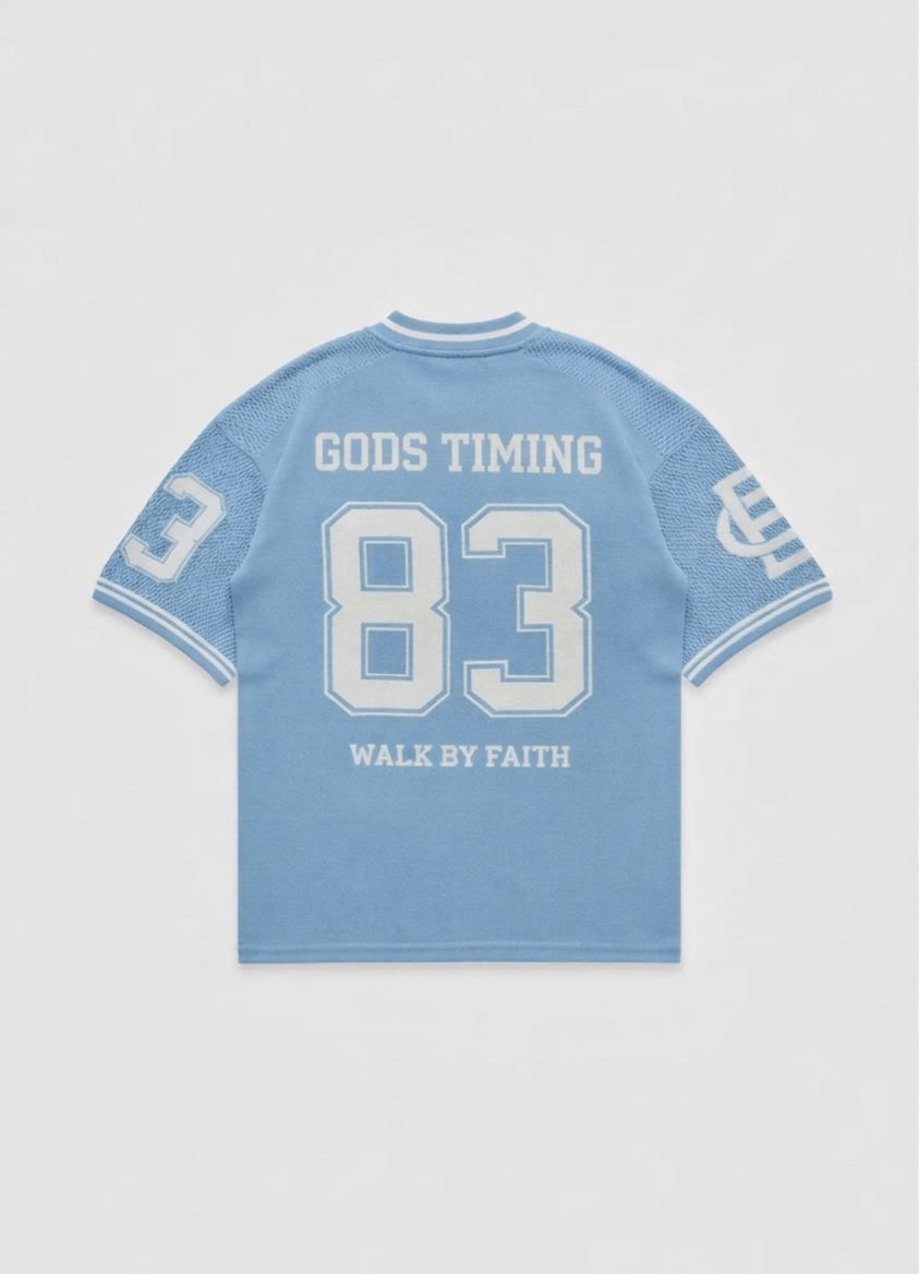 Back view of Benir Clothing light blue knit jersey featuring the number 83 and God&